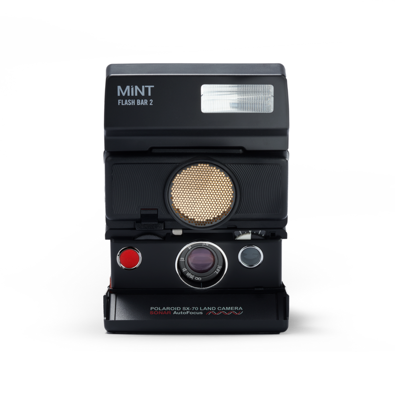 Polaroid SX-70 Autofocus Instant Camera with flashbar