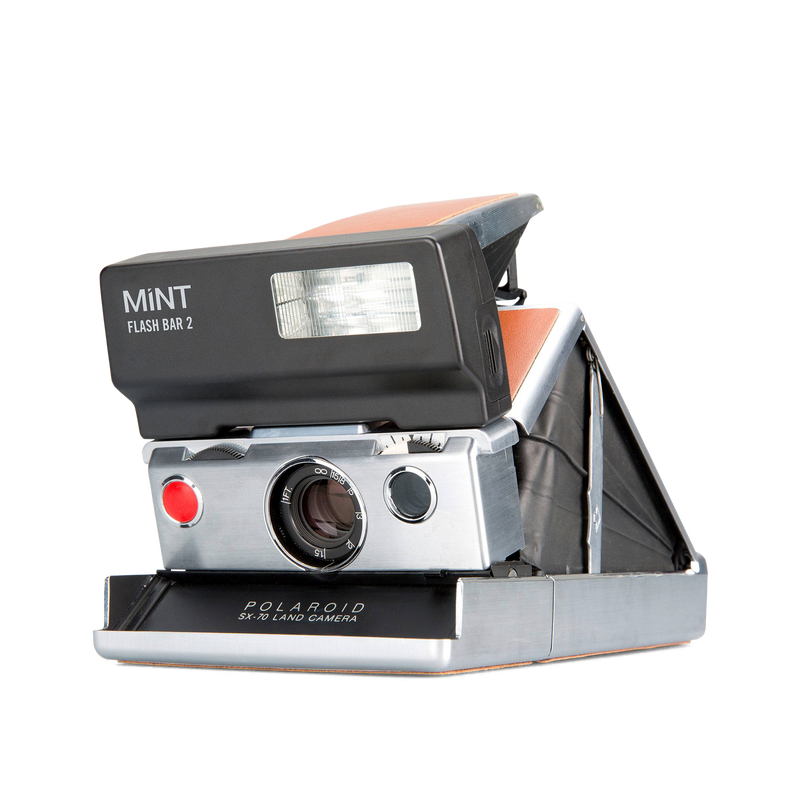 Polaroid SX-70 Autofocus Instant Camera with flashbar